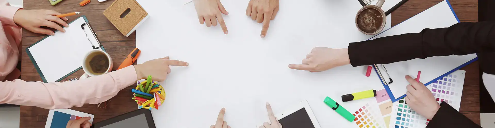 Hands pointing in a circle